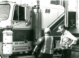 Man & woman near truck