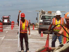 3 hwy maintenance workers in the work zone