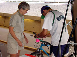 A woman and a man with bike