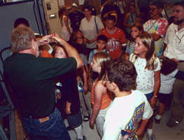 Man & schoolchildren at Camp Mn/DOT