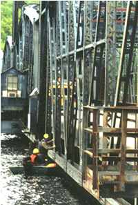 Bridge inspectors under the Stillwater Bridge