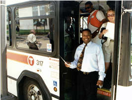 3 people getting off bus