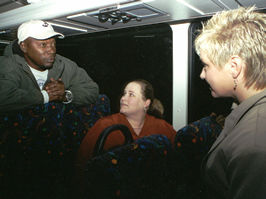 3 people inside bus
