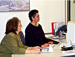 Two women looking at computer