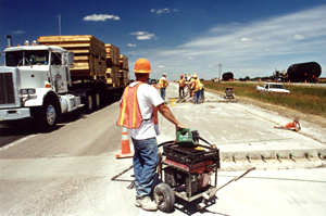 worker in highway work zone