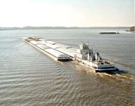 Tow boat & barges on river