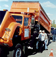 3-axel orange dump truck
