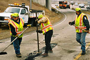 patching crew looking at traffic