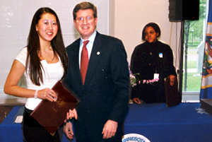 3 people at awards ceremony