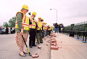 Line of people wearing safety vests