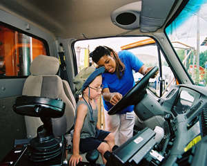 Woman, child in snowplow