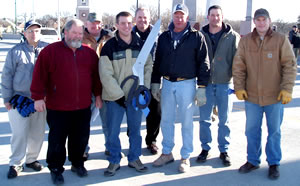 8 men at bridge ribbon-cutting