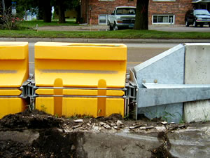 Portable water-filled highway barriers