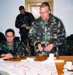 Soldiers looking at map
