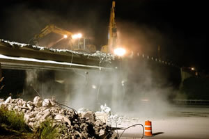 Night shot of bridge coming down