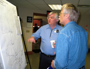 2 men looking at map