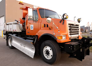 Snowplow in parking lot