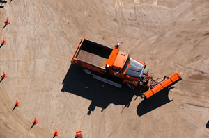 Aerial view of snowplow on sand