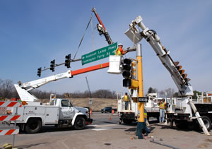 Crews tear down sign