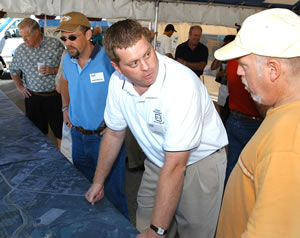 Men talking at hwy display