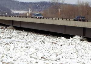 Ice jammed under bridge