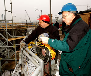 2 men in hard hats