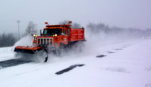 Truck plowing snow