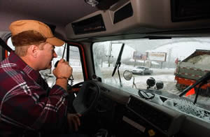 Man in snowplow