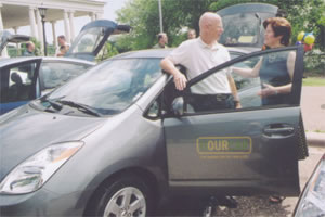 Man, woman outside car