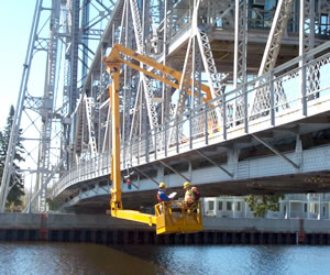 Men inspecting bridge