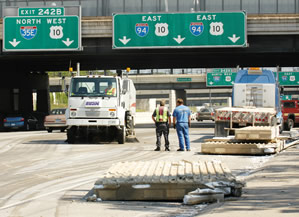 Construction material spilled from a flatbed truck