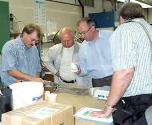 4 men in a lab