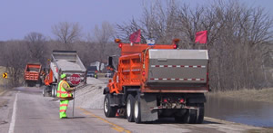 Crews, trucks on road