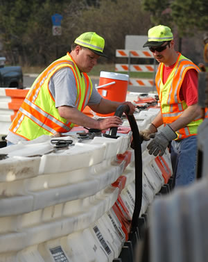 2 men working on bridge