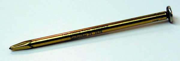 Gold, spike-shaped pen