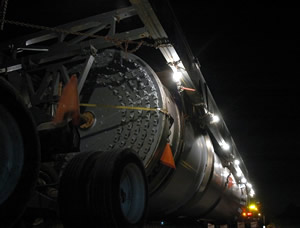 Rear view of truck pulling oversized load