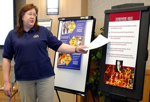 Woman describing info displays