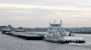 Towboat pushing barges