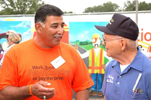2 men talking at state fair