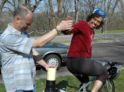 Man, woman on bike