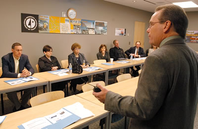 Man speaking before group