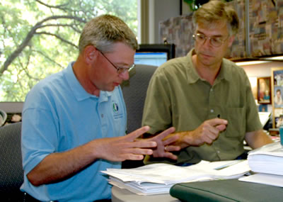 2 men at desk