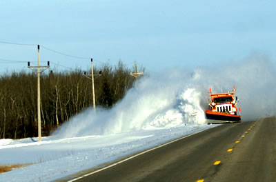 Truck plowing shoulder