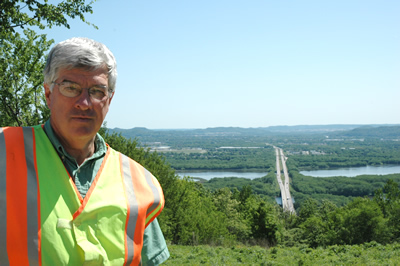 Man in safety vest outdoors