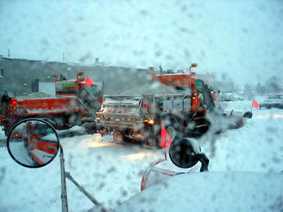 Snow plows in heavy snow