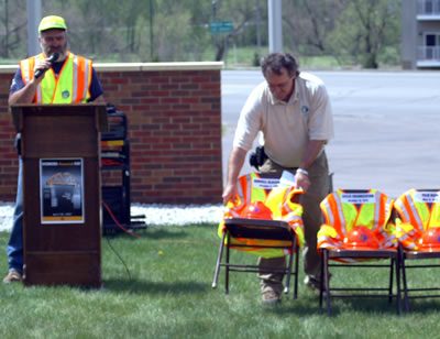 2 men at Workers Memorial Day observance