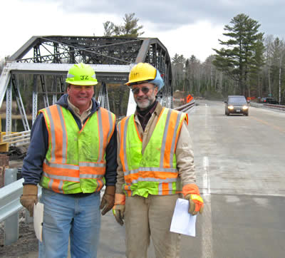 2 men on bridge