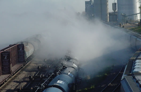 Acidic smoke billows from derailed train