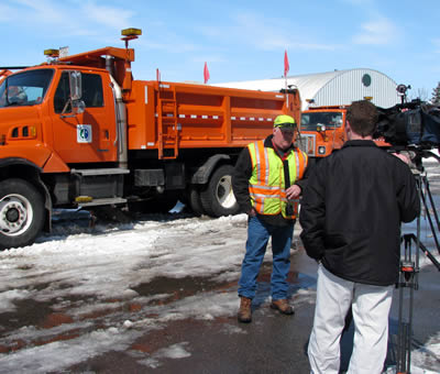 Man interviewed near snowplow