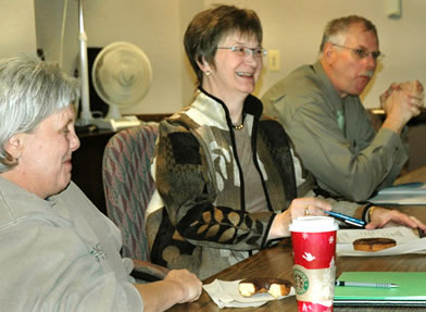 3 people in a meeting